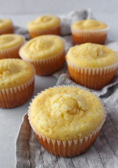 several muffins sitting on top of a cloth