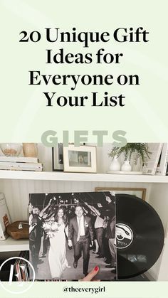 a record player holding up an album with the words 20 unique gift ideas for everyone on your list