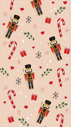 a christmas pattern with candy canes, presents and nutcrackers on it