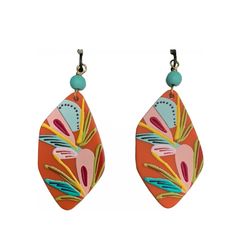 two pairs of earrings with colorful designs on them