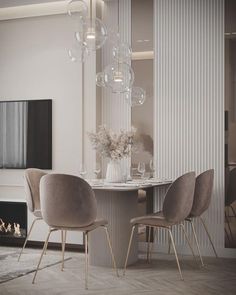 a dining room with chairs, a table and a fireplace