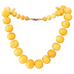 Genuine Baltic amber necklace made of 46 egg yolk round beads. Measuring from 10mm to 20mm in diameter, recently restrung. The size of the necklace is 29 inches long, a nice warm color. Made in Lithuania, in the early 20th century. 113 grams. Baltic Amber Necklace, Cabochon Jewelry, Amber Necklace, Egg Yolk, Baltic Amber, Fine Jewellery, Bead Necklace, Warm Colors, Round Beads