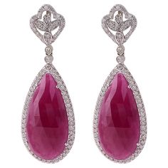 Ruby Teardrop Earrings For Formal Occasions, Fine Ruby Drop Earrings Jewelry, Formal Pear-shaped Ruby Jewelry, Elegant Ruby Diamond Earrings, Elegant Pear-shaped Ruby Jewelry, Ruby Teardrop Earrings Fine Jewelry, Luxury Ruby Dangle Earrings, Luxury Ruby Earrings Fine Jewelry, Luxury White Ruby Earrings