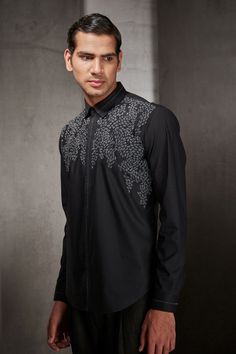 Black shirt in cotton base fabric, featuring intricate thread embroidery on the shoulder yoke.
Component: 1
Pattern: Embroidered
Type Of Work: Thread Work
Neckline: Collar
Sleeve Type: Straight Full
Fabric: Cotton
Color: Black
Other Details: 
Cuff hem sleeves
Closure: Front zipper
Note: Pant worn by the model is not for sale
Occasion: Party - Aza Fashions Rahul Khanna, Cotton Shirts For Men, Black Thread, Thread Embroidery, Work Shirt, Thread Work, Work Shirts, Aza Fashion, Casual Shirts For Men