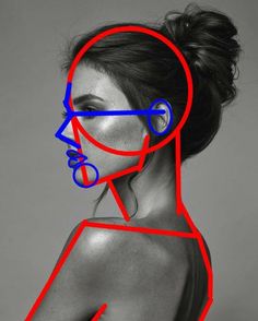 a woman's face is shown with red and blue lines in the shape of scissors