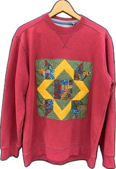 Relaxed Fit Patchwork Crew Neck Sweatshirt, Casual Crew Neck Sweater With Patchwork, Cotton Patchwork Long Sleeve Sweater, Winter Cotton Sweatshirt With Patches, Casual Long Sleeve Quilted Top, Casual Quilted Cotton Tops, Cotton Patchwork Crew Neck Sweatshirt, Cotton Patchwork Sweatshirt With Crew Neck, Red Patchwork Sweatshirt For Fall