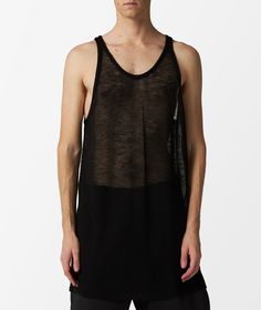 Rick Owens, known for its avant-garde designs and dark color palette, continues to push boundaries in the fashion industry, showcasing a unique vision that challenges traditional norms.Elevate your wardrobe with the Rick Owens Knit Tank Top in black from the Spring/Summer 2024 collection. This timeless piece, perfect for layering or as a standalone statement, is a must-have for your Camisetas de Tirantes collection. Get yours now at SVD and embrace the signature Rick Owens aesthetic. Black Knit Tops For Streetwear, Black Knit Streetwear Tops, Black Knit Tops For Layering, Black Fine Knit Tops For Summer, Fine Knit Black Top For Summer, Summer Fine Knit Black Tops, Black Knit Crew Neck Top, Knit Tank Top, Avant Garde Fashion