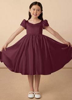 Juno is our sweet and classy matte satin dress. She features adorable puff sleeves, a sweetheart neckline, a A-line skirt, and a beautiful bow at the back of the dress. Satin Flower Girl Dresses, Satin Flower Girl Dress, Rust Dress, Dress Flower, Peacock Green, Tea Length Dresses, Matte Satin, Fashion Gallery, Flower Girl Dress