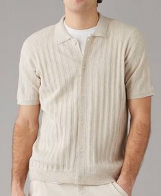 White Collared Ribbed Sweater, Casual Knit Polo Sweater With Buttons, Spring Ribbed Polo Collar Sweater, Casual Button-up Ribbed Sweater, Casual Ribbed Polo Sweater With Collared Neckline, Casual Button-up Sweater With Ribbed Collar, Relaxed Fit Collared Polo Sweater For Loungewear, Casual Polo Sweater With Johnny Collar For Spring, Beige Short Sleeve Casual Polo Sweater