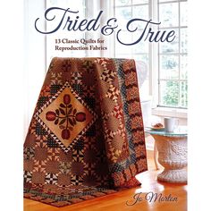 a book cover with a quilt on the floor and window in the background, which reads tried & true