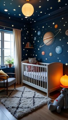 a baby's room with stars and planets on the wall