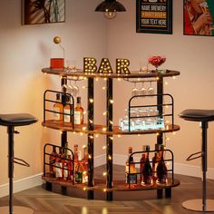 a bar cart with bottles and glasses on it