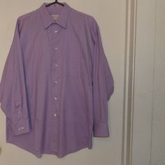 Color Light Lavender, Button Down , Long Sleeves Feature One Wrist And One Button Cuff With Two Buttons For Placement, One Open Breast Pocket , Material Is Cotton , Condition Is New Without The Tags And Never Worn Or Washed No Issues To Note , Size 17 Neck Measurements Are Roughly 32" From Shoulder To Hem And About 25" Pit To Pit With A Sleeve Length Of About 23" , Pet Friendly Non Smoking Home. Purple Long Sleeve Dress Shirt With Buttons, Purple Long Sleeve Dress Shirt With Button Closure, Purple Formal Shirt For Spring, Purple Long Sleeve Formal Top, Fitted Purple Top For Semi-formal Occasions, Purple Fitted Top For Semi-formal Occasions, Purple Cotton Button-up Dress Shirt, Purple Long Sleeve Formal Shirt, Semi-formal Purple Cotton Shirt