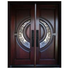 the front door to a home with glass and wood doors, including two sidelights