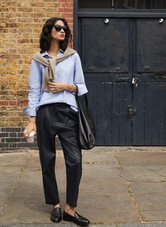 Description Fits true to size, we suggest ordering your normal size. We’ve reimagined the classic, carrot-leg trouser in butter-soft European leather and a choice of neutral colourways. Dressed up with blouses and loafers or down with sneakers and sweats, they’ll lend a sophisticated twist to any look. The Faiza feature a pleat detail around the high-rise waist, pockets and fasten with a zip and a button. It’s crafted from premium European leather and made in a family run atelier in Portugal. Cr Oxford Style, Leather Trousers, Tailored Pants, Boyfriend Fit, Fashion Collection, Cotton Shirt, Shirt Blouses, Oxford, Organic Cotton