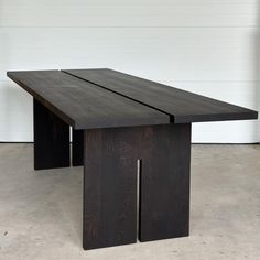 An open joint table provides a detailed visual approach to a standard table design.  An intense black, slab leg, modern design.  Tables will be built using Oak, Elm or Ash hardwood material.  Standard width: 36" Standard height: 30"  O R D E R I N G// -Please choose the size in the drop down menu.  -COLOR: When purchasing a standard table from the listing your table will be finished in an intense black, hard wax oil.  *Other finish colors available upon request once an order is placed.  CUSTOM O Modern Black Dining Table Wood Sintered Stone Too, Charred Wood Table Top, Black Waxed Furniture, Modern Dining Table Black, Hardwood Dining Table, Tree Bookcase, Black Dining Table, Pallet Wine Rack, Live Edge Furniture