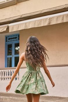 A summer delight, the Dara Short Dress in green captures the essence of boho chic charm, crafted from a comfortable cotton-linen blend. Fitted at the bust, this playful dress features a sweetheart neckline and delicate spaghetti straps, adding a touch of femininity to the style. Highlight embroidery and strategic placement prints elevate the look, creating an eye-catching aesthetic. The tiered hemline brings movement and flair, perfect for twirling on a sunny day. Fully lined and finished with a Green Sundress For Summer, Green Sleeveless Sundress, Green Boho Print Sundress For Summer, Green Strapless Sundress, Green Summer Sundress, Green Sundress For Summer Garden Party, Green Cotton Sundress Midi Dress, Flowy Cotton Sundress For Garden Party, Green Mini Dress For Summer Garden Party