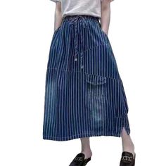 Introducing the 2023 Spring-Summer Collection's Informal Stripe Women's Denim Skirt! This stylish. high-waisted skirt is the perfect blend of contemporary vogue and nostalgic rebellious. With its laid-back vertical stripes. drawstrings closure. and lengthy silhouette. this denim skirt is sure to be your go-to outfit for any summer occasion.Why You'll Love It: Grunge Galore: Inspired by the iconic '90s punk movement. this denim skirt will have you feeling like a trendsetter. Stylish Stripes: The Denim Skirts Online, Womens Denim Skirts, Long Denim Skirt, Jeans Skirt, Denim Skirt Women, Current Fashion, Current Fashion Trends, Casual Stripes, Vertical Stripes