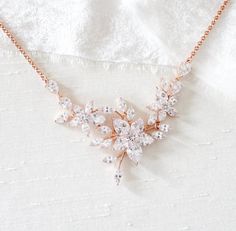 Rose gold cubic zirconia floral Bridal necklace - LILY – Treasures by Agnes Lily Jewelry, Rose Gold Theme, Lily Necklace, Backdrops Necklace, Summer Bride, Bridal Accessories Jewelry, Zirconia Necklace, Cubic Zirconia Necklace, Bridal Look