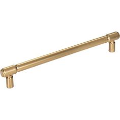 an antique brass finish pull handle on a white background