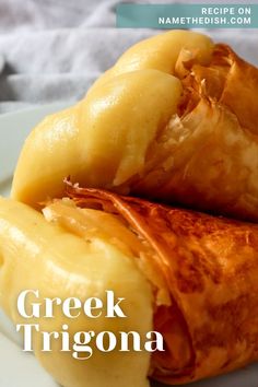 some food is on a white plate with the words greek trigona