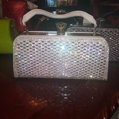 Womens Glitz And Glam Handbags With White Or Black Trim White Handheld Box Bag For Party, Glamorous White Party Bags, Chic Rectangular Bag With Glitter, White Clutch Box Bag For Party, Chic Rectangular Glitter Bag, White Party Clutch Box Bag, Silver Rectangular Clutch For Shopping, Rectangular Glitter Bag For Everyday Use, Rectangular Glitter Bags For Everyday Use