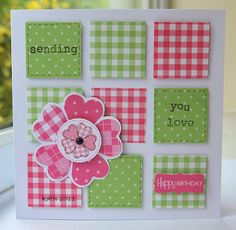 a card with pink, green and white squares on it that says sending you love