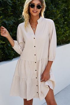 Details:  Split Neck Plaid Print Button Up Tunic Dress Plaid print
  Three quarter sleeve Mini length Skin friendly Fabric: 100% polyester Size: S, M, L, XL.  For more country size measurements, please click here.
   Size/In US Bust Sleeve
 Length S 4-6 36.22
 23.43
 36.22
 M 6-8 37.80
 23.82
 37.01
 L 8-10 40.16
 24.41
 37.80
 XL 10-12 42.52
 25.00
 38.58
 Please allow 0.4"-0.8" differs due to manual measurement. Teacher Dresses, Stand Collar Shirt, Plaid Sleeve, Collared Shirt Dress, Dress Stand, Cotton Blends Dress, Spandex Dress, Checkered Shirt, Gingham Dress