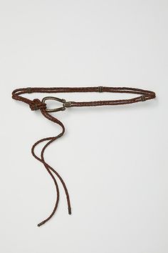 *The* perfect piece to add a western-inspired touch to every look, this effortlessly essential belt is featured in a thin, lasso silhouette with defined metal piecing throughout for added dimension. | Lasso Wrap Belt by Free People in Brown Halloween Costumes Cowgirl, Costume Cowgirl, Wrap Belt, Boho Clothing, Cognac, Halloween Costume, Free People, Women Accessories, Halloween