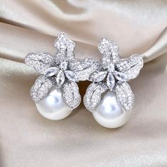 Wedding Jewelry - Orchid Pearl and Cubic Zirconia Bridal Earrings - Available in Silver and Gold Luxury Party Earrings With Halo Design, Bridal Accessories Belt, Cubic Zirconia Bridal Earrings, Hair Accessories Tiara, Pearl Pendant Earrings, Silver Bridal Earrings, Feminine Earrings, Flower Girl Jewelry, Pearl Bridal Jewelry