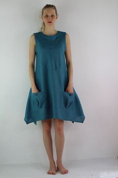 "Handmade teal linen dress sleeveless, perfect for casual wear and suitable for any occasion in summer season Details: - 100% natural linen produced in Europe ; - medium weight (180 gram per square meter); - color: teal, could be any from our colors catalogue (color samples at the photo); Made to order, approximately a few days, If you have any questions please message me and I will be glad to answer. Size guide : Size XS Bust: fits bust around 33\"-34\"/ 84-88 cm Waist: fits waist around 25\"-2 Sleeveless Turquoise Sundress For Summer, Turquoise Sleeveless Sundress For Summer, Sleeveless Turquoise Summer Dress, Sleeveless Turquoise Dress For Summer, Turquoise Sleeveless Summer Dress, Summer A-line Sundress With Pockets, Blue Sleeveless Dress With Pockets For Summer, Casual Turquoise Sleeveless Mini Dress, Turquoise Mini Dress For Summer