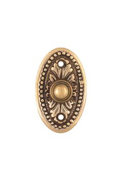 an antique brass cabinet door knob with a decorative design on the front and back side