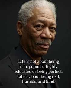 an older man in a suit with a quote on it