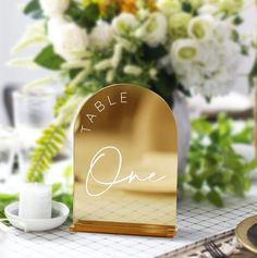 Gold Mirror Acrylic Table Numbers - Wedding Table Signs - Wedding Signage - Wedding Table Decor - Wedding Table Numbers with Stand These arched gold mirror table numbers are the perfect touch to add to your wedding. Our elegant table numbers come with gold acrylic stands. HOW TO ORDER Choice of style If you need 9 signs, you need to select the 1-9 option from the drop down menu. COORDINATE * Bar Sign * Guestbook Sign * Welcome Sign * Seating Chart Sign TABLE NUMBER SIZE * 5"x7" Table Signs Wedding, Table Numbers Gold, Wedding Table Signs, Signage Wedding, Gold Mirror Acrylic, Table Decor Wedding, Acrylic Table Number, Signing Table Wedding, Signs Wedding