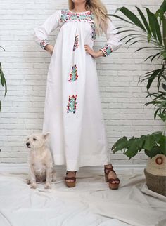 Vintage 1960's artisan made oaxacan maxi dress. Features rare long sleeves, hand embroidered details throughout and crochet lace trim. Long maxi length with medium weight high quality cotton.   𓃥 Measurements 𓃥   Size:Small (taken laying flat ) Bust: 17.75" Waist: open / 30.5" Hips: open / 30.5" Shoulders ( bib seam to seam ) 14" // Actual shoulders 16" Length: 55" Sleeves: ( bib seam to wrist ) 21"  𓃥 Label & Fabric 𓃥   Handmade in Mexico 100% Cotton  𓃥 Condition 𓃥   Excellent vintage con Hand Embroidered Dress, Long Sleeve Embroidered Dress, Crochet Lace Trim, Mexican Dresses, Wedding White, 60s Fashion, Red Mini Dress, Long Maxi, Vintage 60s