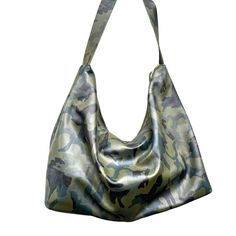 All our bags are made to order. Production time is 3-5 business days, up to 7 days for custom orders.  Soft, slouchy leather hobo bag, extra  large shoulder bag in camouflage leather with brass top zipper, black lining.  FUNCTIONALITY:         *       Super spacious and durable to be used as a everyday bag         *       Fits all size laptops, 17" fills the whole bag + room for a couple of books , wallet         *Over the shoulder long leather strap to wear over layers super durable. *Large int Reversible Hobo Shoulder Bag For Everyday Use, Reversible Hobo Bag For Travel, Reversible Shoulder Bag For Errands, Everyday Reversible Hobo Bag, Reversible Hobo Shoulder Bag For Travel, Reversible Hobo Bag For Daily Use, Reversible Double Handle Hobo Bag For Everyday Use, Daily Use Reversible Hobo Bag, Reversible Leather Tote Shoulder Bag