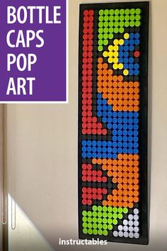 a wall hanging made out of legos with the words bottle caps pop art