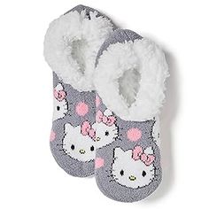 two pairs of hello kitty slippers are shown