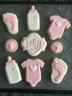 baby shower cookies decorated with pink and white icing