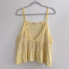 This Buttery Yellow Tank Has A Flowy Fit And A Cropped Cut. The Material Is A Soft Rayon/Spandex/Poly Blend And It’s Brand New Without Tags From A Boutique. It Measures About 20” From Underarm To Underarm And About 23.5” In Length. C3 Spring V-neck Open Knit Tank Top, Spring Pointelle Knit Cami Top, Spring V-neck Crochet Top With Open Knit, Spring V-neck Crochet Top For Layering, Spring Layering Stretch Crochet Top, Stretch Crochet Top For Spring Layering, Spring Stretch Crochet Top For Layering, Spring Crochet Lace Tank Top, Spring Tank Top With Crochet Trim For Day Out