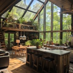 a kitchen and living room with lots of windows