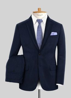 As a general rule, blue suits always look good, but when dressed in fine pinstripes, they look sensational, just like our Scabal Sapphire Pinstripe Blue Wool Suit. Crafted from pure wool fabric with natural stretch, it boasts a rich blue hue and is finished with ultra-fine pinstripes, giving you a good-looking suit season after season. This suit is the perfect choice for the demands of the corporate nine-to-five or for wherever the hours of five-to-nine take you.  Look Includes    Scabal     Sap Fitted Pinstripe Single Breasted Suit, Pinstripe Suit With Notch Lapel For Business Casual, Pinstripe Notch Lapel Suit For Business Casual, Tailored Pinstripe Blazer, Classic Pinstripe Wool Suits, Pinstripe Wool Suit For Office, Pinstripe Single Breasted Suit For Business Casual, Fitted Pinstripe Suits For Business Casual, Striped Semi-formal Suits With Welt Pockets