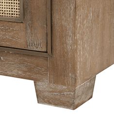 an old wooden cabinet with wicker doors and drawers on one side, isolated against a white background