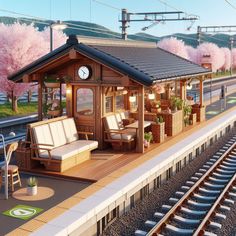 a small train station with benches and tables on the platform next to it is covered in pink flowers