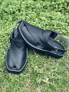 "Widely recognized as the Peshawari Chappal, these sandals hold a special place in the cultural heritage of Khyber Pakhtunkhwa province, Pakistan. Meticulously crafted with a focus on a lightweight in-seamed sole and supple leather, our Peshawari chappals are renowned for their durability, comfort, and versatility. Embraced not only in Pakistan but also across borders in India, Europe, the United Kingdom, and the USA, the Peshawari Chappal has transcended its regional roots to become a global sy Traditional Leather Open Toe Huaraches, Traditional Leather Huarache Sandals With Closed Toe, Traditional Leather Closed Toe Huarache Sandals, Traditional Handmade Closed Toe Huaraches, Traditional Handmade Leather Huaraches, Handmade Traditional Leather Huaraches, Traditional Closed Toe Leather Sandals, Traditional Black Sandals With Single Toe Strap, Leather Sandals With Dabka And Round Toe