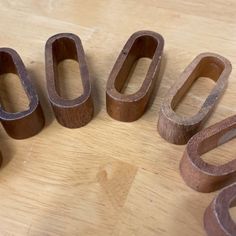 several different types of woodworking tools sitting on a table with one being cut into smaller pieces