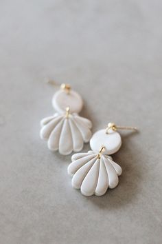 Sea Shells Polymer Clay Earrings - Etsy Clay Shell Earrings, Adjustable White Resin Jewelry, Elegant White Resin Jewelry, Adjustable White Drop Earrings, White Polymer Clay Dangle Earrings, White Dangle Earrings In Polymer Clay, Handmade White Resin Earrings, Elegant Clay Drop Earrings, White Polymer Clay Earrings With Ear Wire