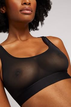 Sporty meets sheer. Surprising support. Micromesh gives an unexpected take on a sports bra-like cut. Smoothing scoop neck wireless pullover with no band or strap hardware. *411* Use this as a guide. Preference is a huge factor — if you’re near the top of a size range and/or prefer more coverage, you may want to size up. *FABRIC* Made from a sheer Belgian power micromesh - nipples are visible Wide plush elastic band for added support Wireless pullover design - aka no hardware 74% Polyamide (Nylon Busty Fashion, Sheer Bra, Unlined Bra, Comfortable Bras, My Wife Is, Demi Bra, Pullover Designs, Bra Top, Bra Sizes