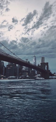 a large bridge spanning the width of a city