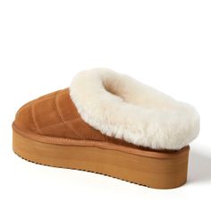 Trust us: they're as cozy as they look. With genuine shearling offering all over comfort and genuine suede providing proven indoor/outdoor durability, these clogs are a must for relaxing anytime, anywhere. Adorned with quilted details and a plush cuff, you're sure to stay cozy with these memory foam clogs. Casual Sheepskin Slip-on Clogs, Winter Suede Clogs, Winter Clogs With Suede Lining, Winter Slip-on Suede Clogs, Winter Comfortable Clogs With Suede Lining, Winter Suede Slip-on Clogs, Winter Clogs With Suede Lining And Comfortable Style, Comfortable Slip-on Clogs With Faux Fur Lining, Comfortable Winter Mules With Suede Lining